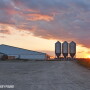 hog barn feed sunset - Lindsey Pound