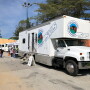 Shown is a mobile health care clinic serving flood-affected residents of Pajaro, Calif. 