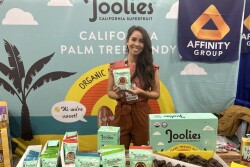 woman holding dates pouch