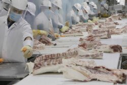 Pork plant workers