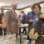 USDA Under Secretary for Marketing and Regulatory Programs Greg Ibach (center) and Caroline Young (left), with the National Peanut Board, get the facts about mushrooms from Mushroom Council Chairperson Gale Ferranto and Mushroom Council Foodservice Director Steve Solomon (2nd from right). 