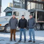 From left, brothers Andrew and Philip Hanna are combining their individual Iowa farm operations with their father, Mark. 