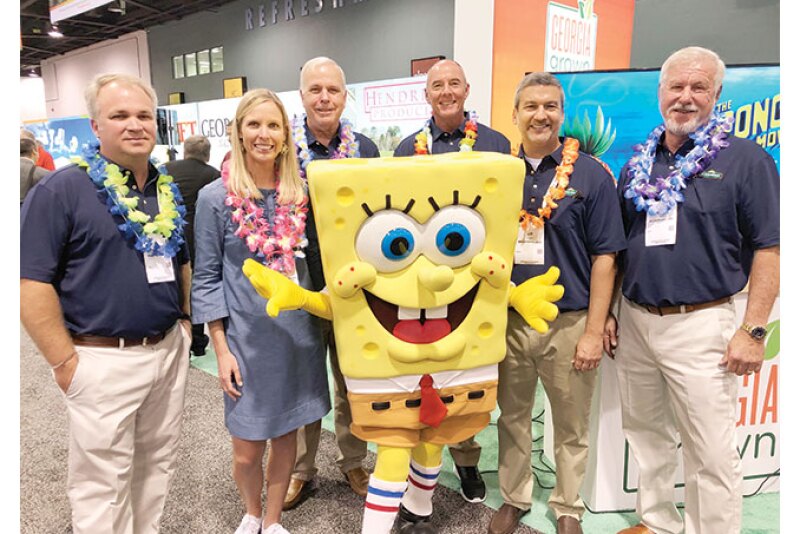 The Bland Farms team stands with SpongeBob at Fresh Summit 2019 after announcing a partnership with the brand for the upcoming Vidalia onion season.
