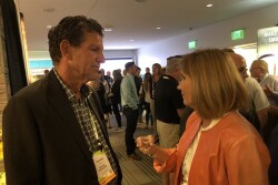 Tim York,  president of Markon Cooperative visits with Julie Krivanek,  president of Krivanek Consulting, Denver, Colo. on July 27 at Produce Marketing Association's Foodservice Conference and Expo in Monterey.