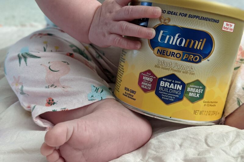 Formula can with baby