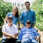 Hudson River Fruit Distributors leadership gathered in an orchard