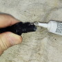 Dielectric grease lubricates and seals electrical connectors against moisture and dust.