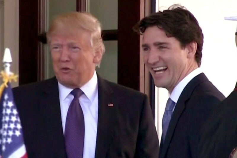 Pres Donald Trump & Canadian Prime Minister Justin Trudeau share a lighter moment in this undated photo. But the smiles were replaced by frowns following the Group of Seven (G-7)  Summit.