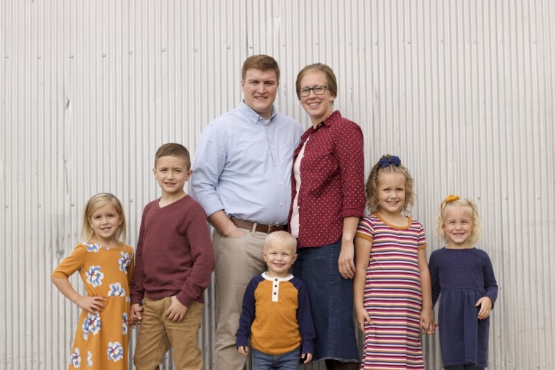 The Mogler family's journey to provide foster care has been life-changing for their entire family. From left are Poppy, Brecken, Chet, Kalvin, Cassie, Lily and Daphne Mogler.