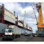 Containers are offloaded from Fresh Del Monte Produce Inc.’s Del Monte Spirit as the energy-efficient vessel makes its Jan. 9 inaugural call at Port Manatee.