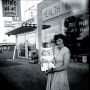 o-founder, Margaret Isely outside the first brick and mortar store, circa 1958.