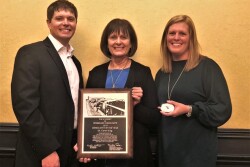 Dr. King’s family accepted the award on his behalf. Pictured left to right: son Clint King, wife Rochelle King and daughter Mandy Madden.