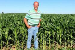 Harnessed to six-row, alternating strips of corn and soybeans, Jim Nichols boomed a 292 bu. yield average. Standing on the edge of his farmland, Nichols points upward at a carbon secret: His corn crop comes from the sky.