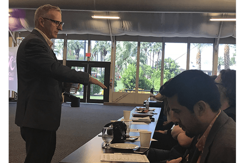 Dave Mitchell, president of The Leadership Difference, speaks with education session attendees during his presentation May 12.