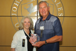CAFÉ president Mary Petersen (from left) awarded Don Odiorne, formerly of the Idaho Potato Commission, the 2019 CAFÉ Champion Award at the 15th-annual CAFÉ Leadership Conference in Charlotte, N.C. 