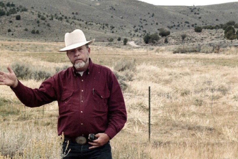This Nov. 1997 file photo, rancher Wayne Hage, a longtime Sagebrush Rebellion figure who died in 2006, is shown in the area where federal agents seized 100 head of his cattle in 1991, in Meadow Canyon near Tonopah, Nev.