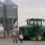 Nate Huntley and kids on farm