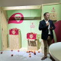 Morgan Rogers, VentureFruit’s general manager, reveals the Tutti apple at Fruit Logistica 2023.