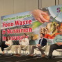 five people on a panel stage