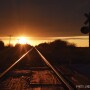 railroad train tracks sunset by Lindsey Pound