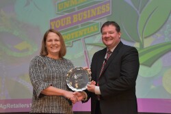 Presented by ARA's Daren Coppock, Kelly Farrell accepts the 2019 Jack Eberspacher Lifetime Achievement Award on behalf of her father, Ron Farrell.