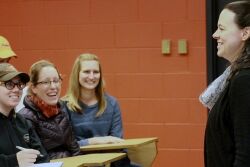 Anna Dilger teaching a class at the University of Illinois