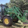 This John Deere 7210 w/ 4200 hours and loader sold for $88,000 on an Oct. 1, 2022 farm auction 