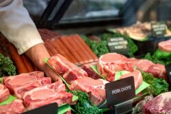 Retail pork in the meat case by National Pork Board
