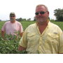 Consultant Robb Dedman, foreground right, and farmer-client Matt Miles keep 120 soybean varieties in constant strip trial motion, searching for the best seed-to-acre match.