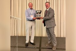 Phil Glaize Jr. receives the 2022 Apple Person for All Seasons award