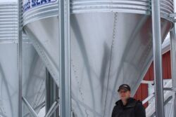 Ryan Stohlquist standing near his barn.