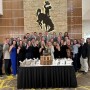 Kstate meat eval team standing with trophy