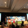FFVA presented its Karen and Mike Stuart Humanitarian Award to Belle Glade ministries Light House Café and Ella’s Closet. Here, representatives of the group express thanks to FFVA for the recognition.