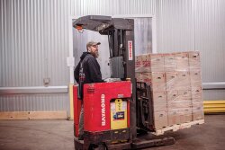A worker loads product at Co-op Partners Warehouse. Melons, locally grown cucumbers and bell peppers and some late corn will be among the wholesale distributor’s products for late summer, says Tom Rodmyre, warehouse director.