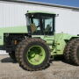 This 1986 Steiger Cougar 1000 with 2931 actual hours sold for record price of $50,000 on 2/25/23 consignment auction in Columbia City, IN by Schrader Real Estate and Auction. 