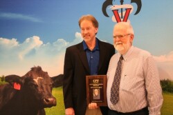 Dr. Andy Johnson (right) has consulted in 32 countries and 46 U.S. states, on dairies ranging from 20 to over 20,000 cows.
