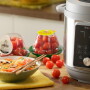 Image of stew and tomatoes with an InstaPot in the background. Photo courtesy of NatureSweet