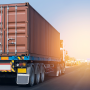 A tractor trailer truck traveling on an interstate highway