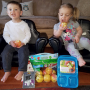 Winners of Stemilt Growers' Snappiest Lil Snapper contest enjoy their prizes.