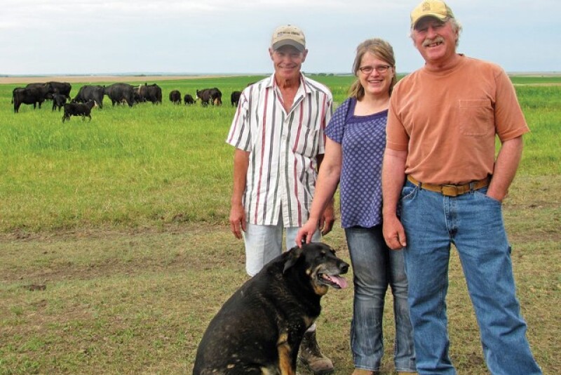 Terry, left, DenaMarie and Wayne Springer are transitioning from row crops to open-pollinating corn and direct-to-consumer beef.