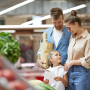 family shopping in produce section