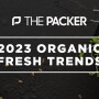 A black bowl of sprouts with overlay text - The Packer's 2023 Organic Fresh Trends