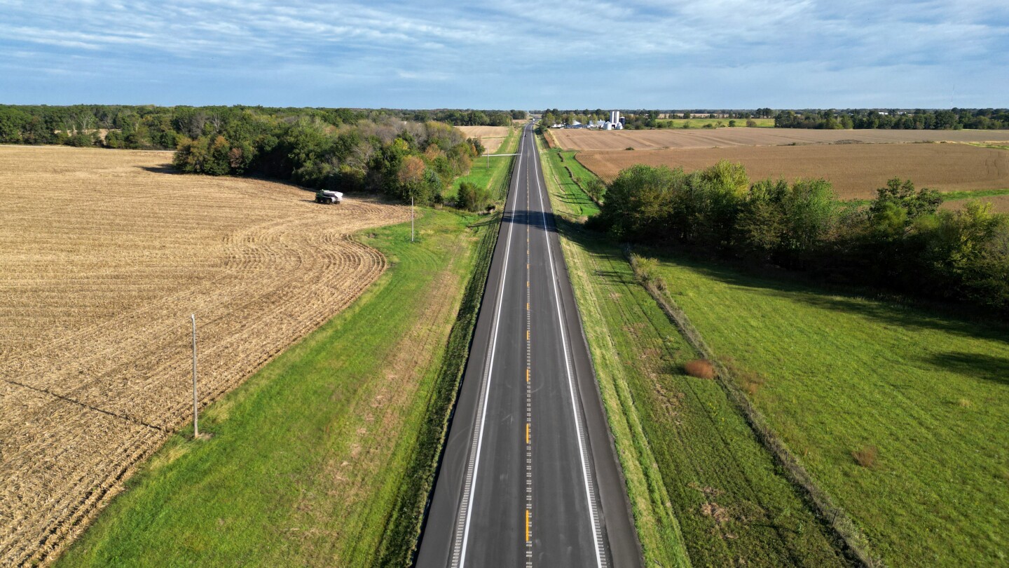 https://assets.farmjournal.com/dims4/default/ea94146/2147483647/strip/true/crop/3500x1969+0+266/resize/1440x810!/quality/90/?url=https://k1-prod-farm-journal.s3.us-east-2.amazonaws.com/brightspot/aa/a7/2e0aa46a47c6a7bda1e4d9f5c069/road-roadway-highway-transportation-rural-roads-lindsey-pound2.jpg