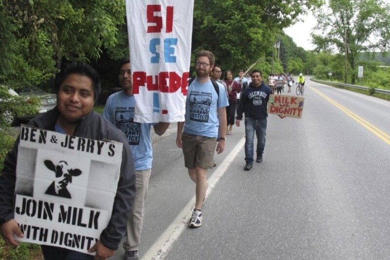 Scores of dairy farm workers and activists marching in Montpelier, Vt., on Saturday June, 17, 2017.