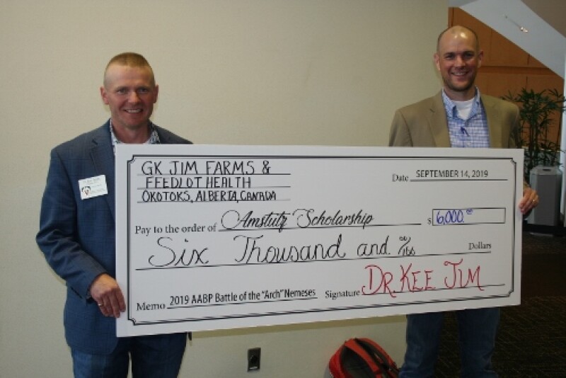 Drs. Eric Behlke (left) and Holt Tripp competed in the 5-K run, motivated by a $6,000 donation to the Amstutz Scholarship from Feedlot Health founder Dr. Kee Jim.