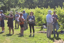 People gather for the annual Ohio Produce Growers & Marketers Association summer tour