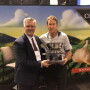The Packer's Tom Karst (left) presents the 2019 Produce Marketer for All Seasons award to Bill Christopher of Christopher Ranch, who accepted the award on behalf of his father Don Christopher. 