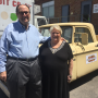 Arnold Caviar and his wife Carol stand in front of his 1965 Dodge truck that he used to peddle produce more than 40 years ago. Caviar retired as Liberty Fruit CEO May 18.