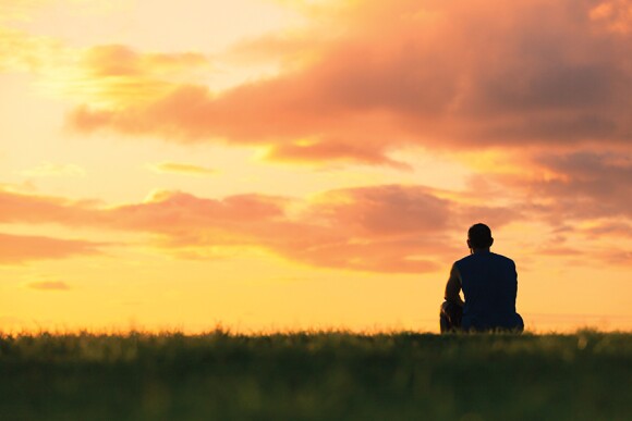 Farmer and sunset iStock