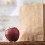 apple and paper bag